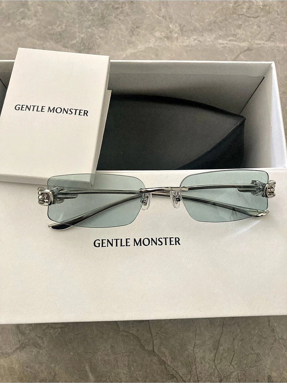 Gentle Monster Rimless Light Blue Lens Silver-Tone Sunglasses